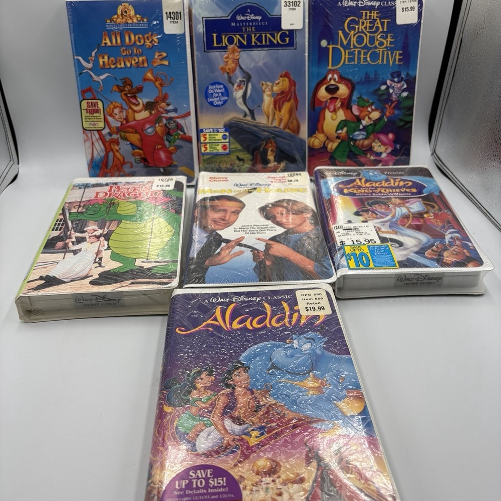 Lot of 7 Factory Sealed Vintage Walt Disney Clamshell VHS Family Movies MGM